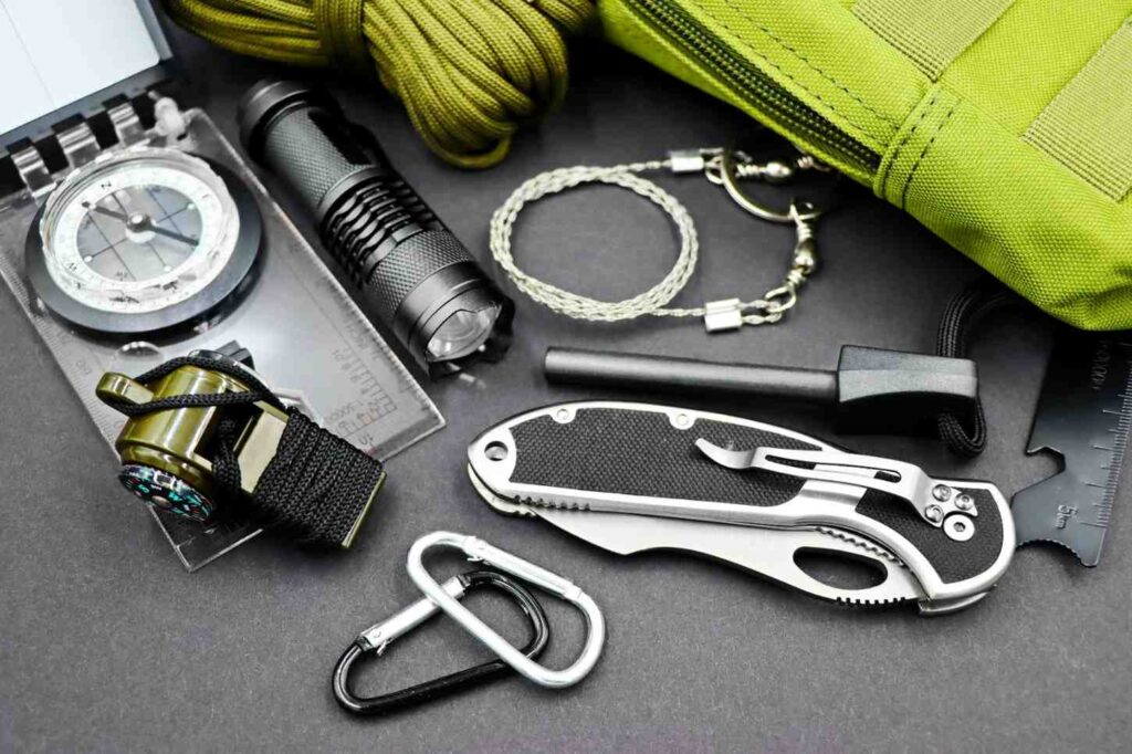 outdoor safety kit with whistle flashlight rope and compass for kayaking
